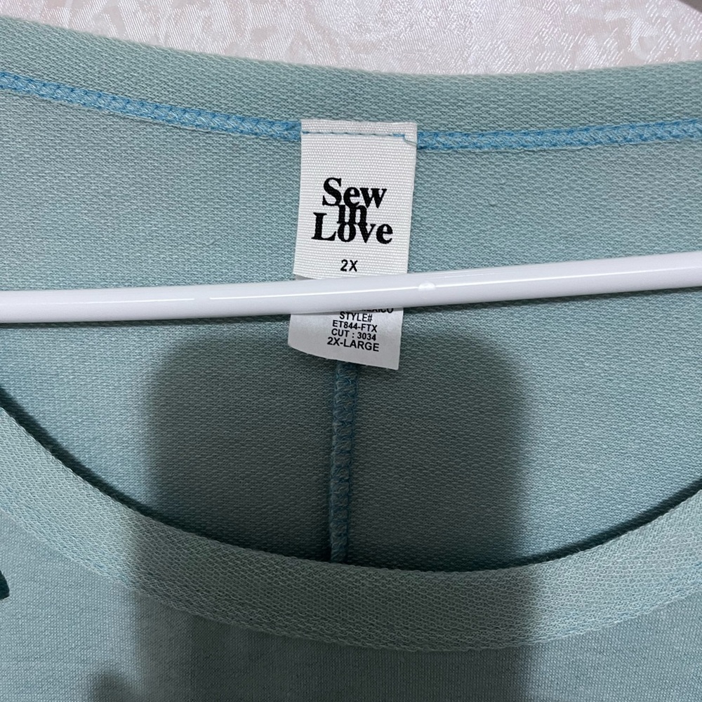 NWT Mint green in color Long sleeve women shirt brand is Sew In Love